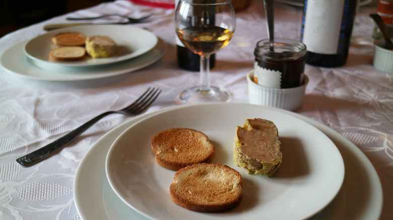 liver pate, crackers, and wine