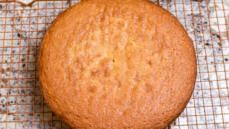 yellow cake on cooling rack