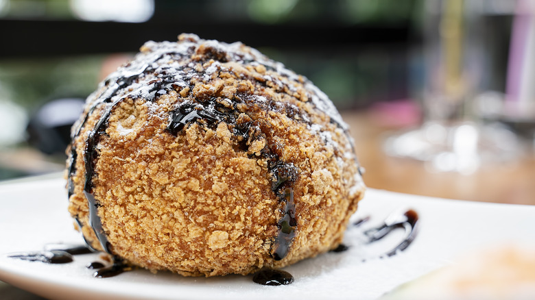 fried ice cream with chocolate drizzle