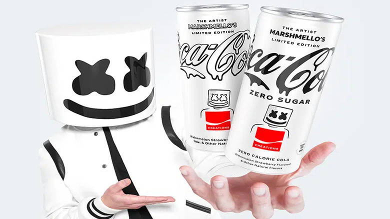 marshmello holding up cans of coca-cola