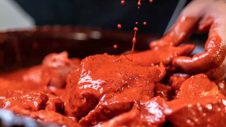 close up of cochinita pibil preparation