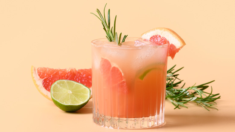 paloma with rosemary garnish