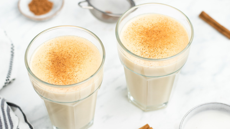 coconut cocktail beside warming spices