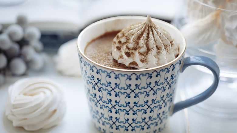 hot chocolate garnished with cream