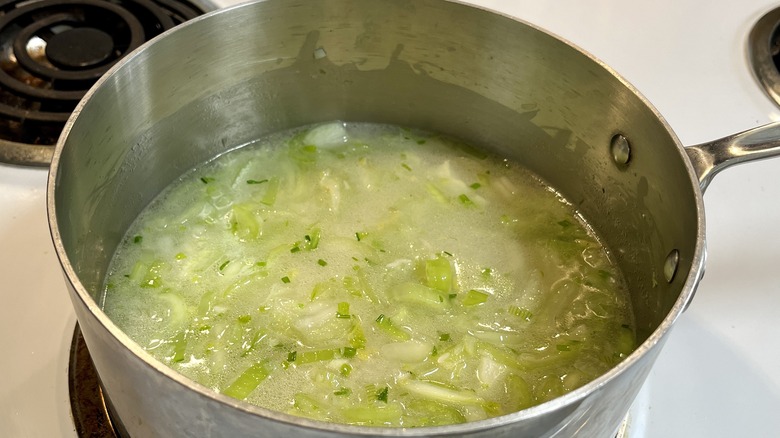 liquid and greens in pot