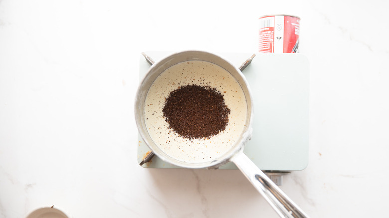 Coffee added to simmering cream