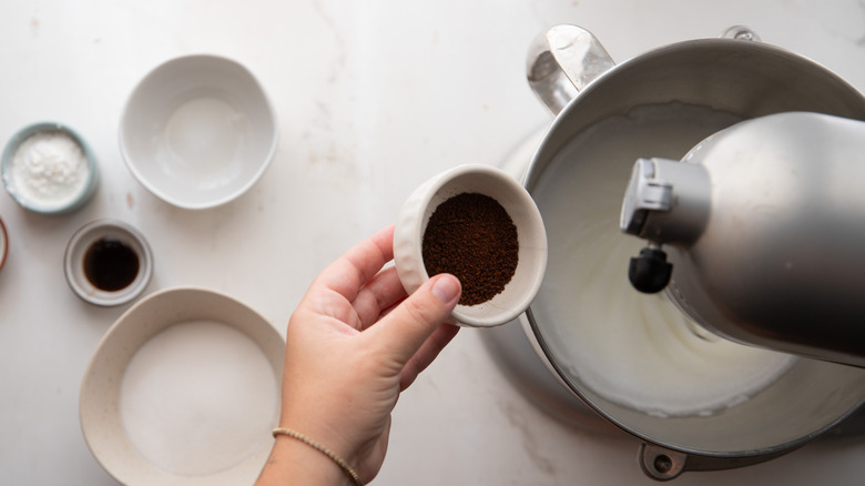 Adding espresso powder to bowl