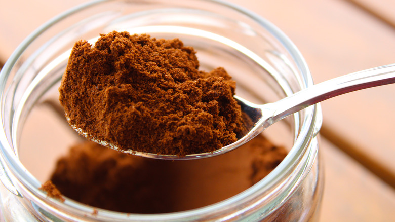 spoonful of coffee grounds