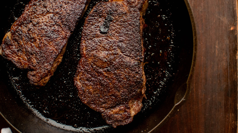 steaks in skillet 