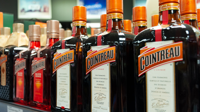 cointreau triple sec bottles on liquor store shelf