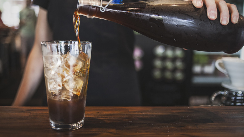 Person pouring cold brew