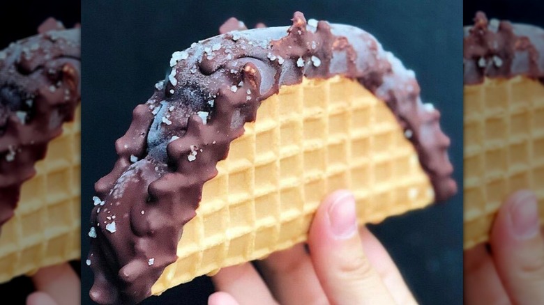 Hand holding a Salt & Straw choco taco