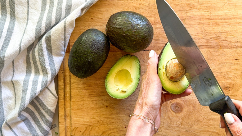 cutting an avocado