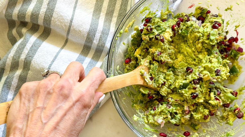 stirring the guacamole