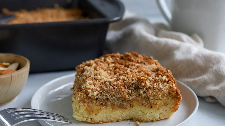 A piece of coffee cake on a plate