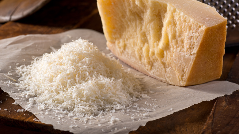 Grated parmesan cheese on table
