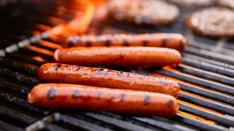 hot dog on a hot grill