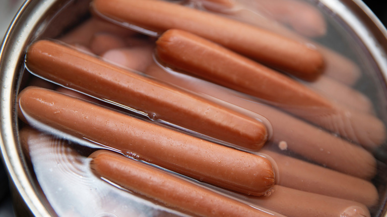 hot dogs in a pot of water