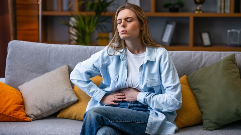 Woman with stomach pain