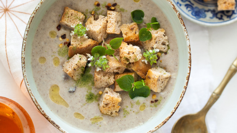 Creamy soup with croutons