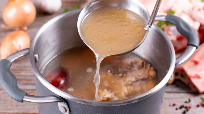 Homemade broth in bowl