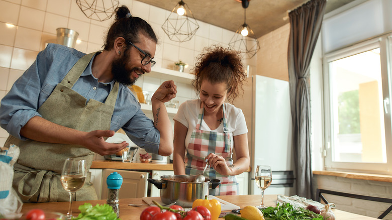 Man and woman cooking