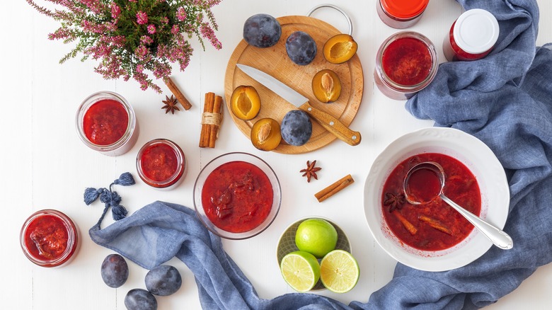 red compote in jars and bowls