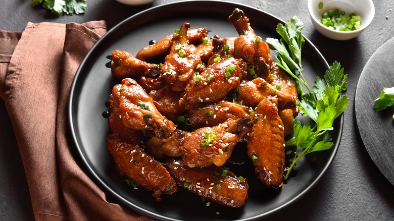 Chicken wings with sauce on a plate