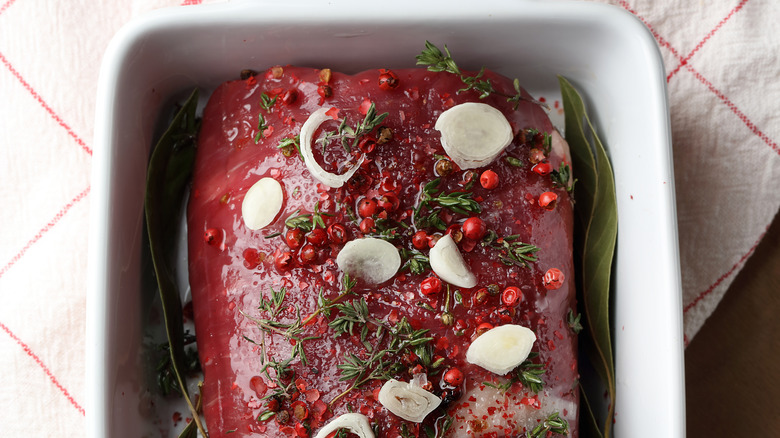 beef marinating in pan