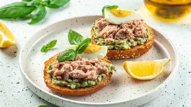 Tuna sandwiches with boiled eggs and avocado