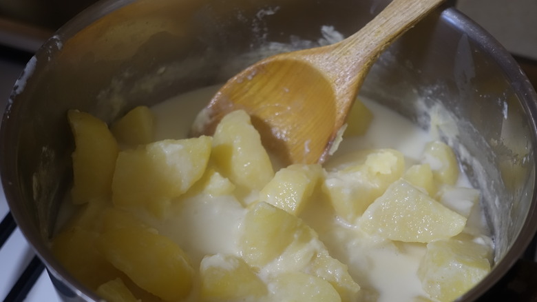 Potatoes cooking in milk