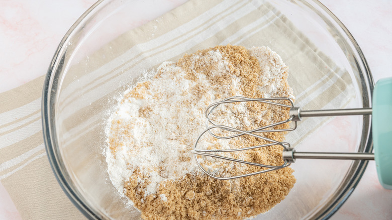 mixing dry ingredients for cupcakes