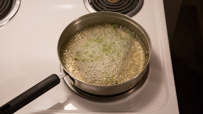 green beans frying in oil