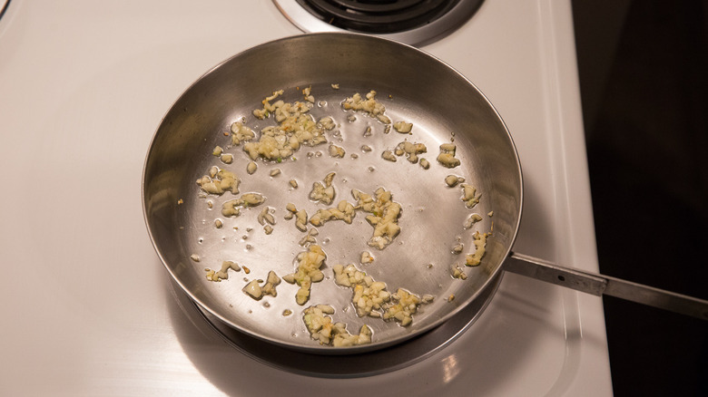 garlic sautéing in skillet