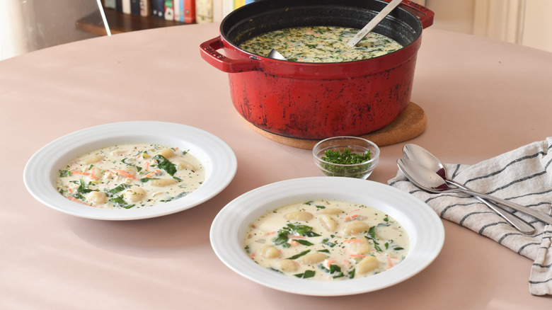 chicken gnocchi soup served in bowls