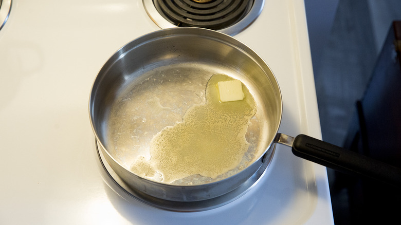 butter melting in saute pan