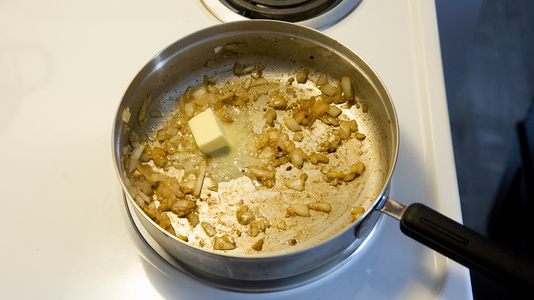 butter melting in saute pan