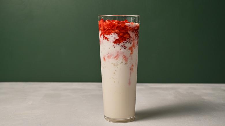 strawberry and cream in glass
