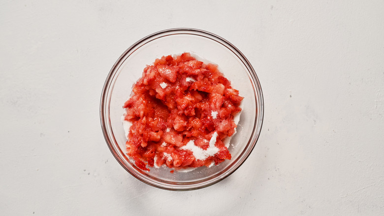 sugar and strawberries in a bowl