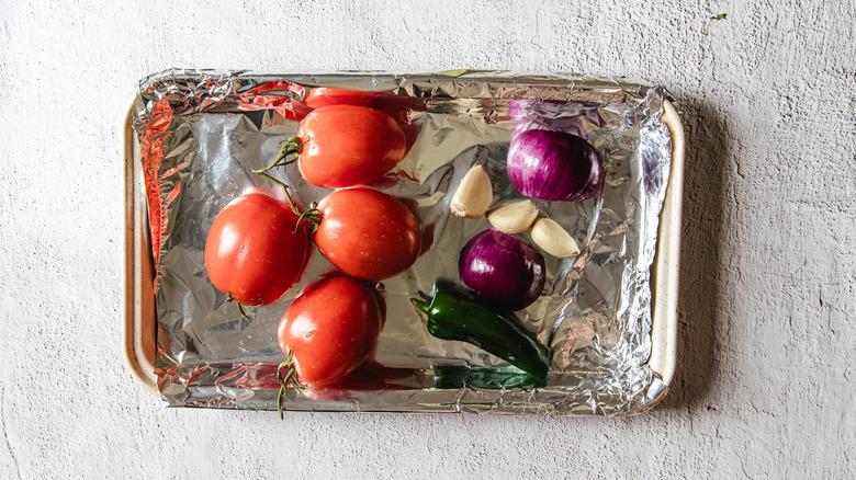 Salsa ingredients on baking sheet