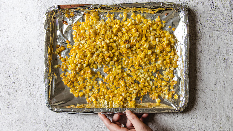 Roasted corn on baking sheet