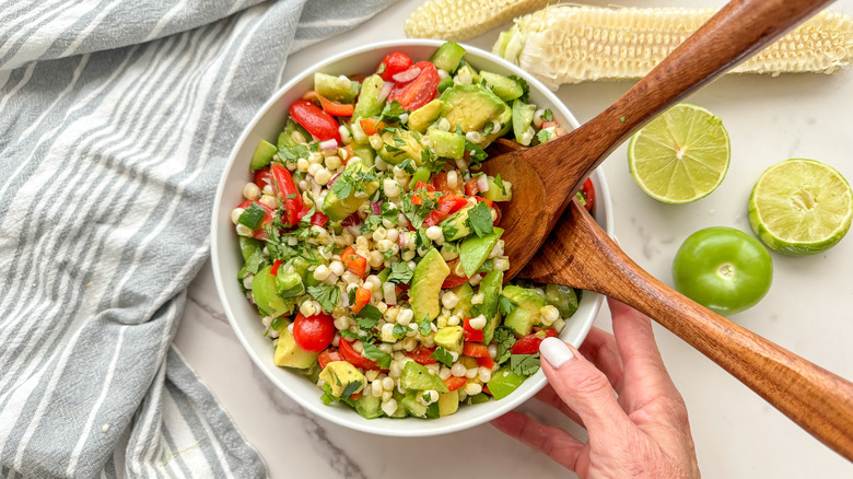 bowl of salad and spoons