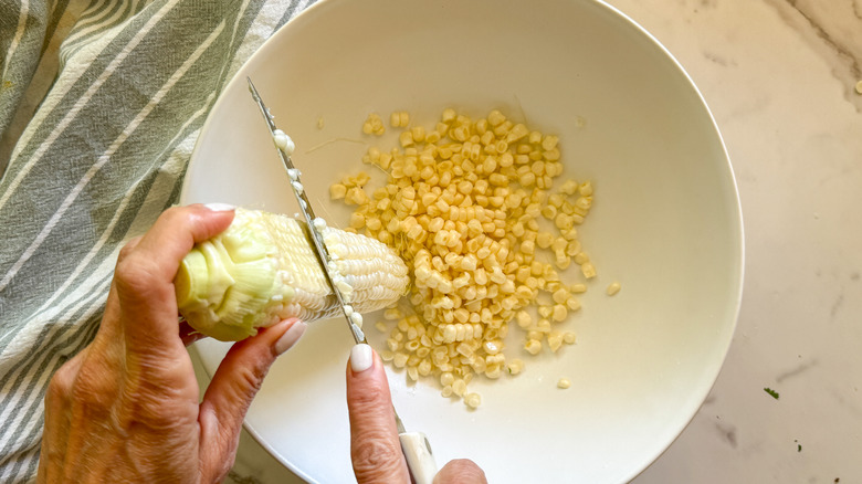 hand cutting kernels from cob