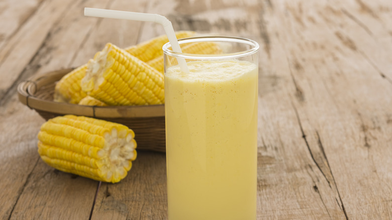 corn and juice in glass