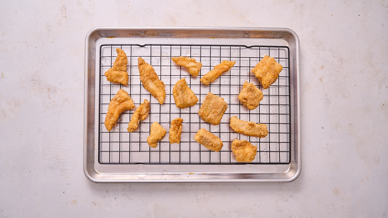 fried catfish on wire rack