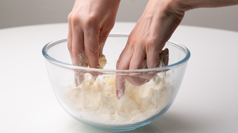 Mixing pastry by hand 