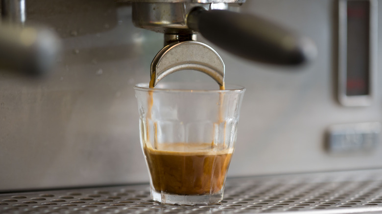 Closeup of espresso being made in a glass cup