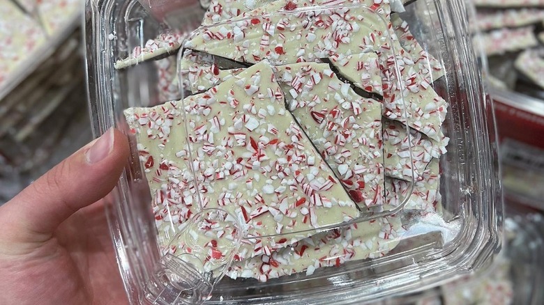 Hand holding package of Costco Peppermint Bark