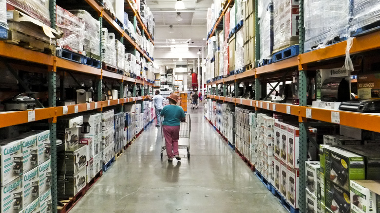 shoppers in Costco aisle