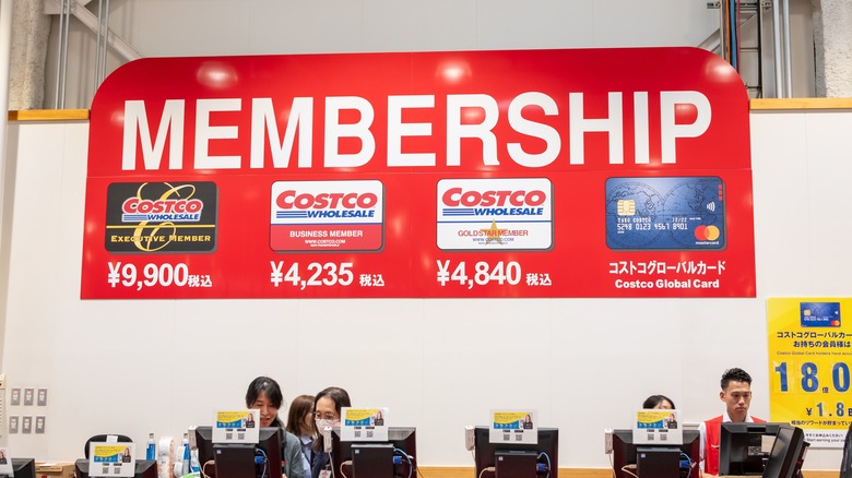 Costco Japan membership counter with workers